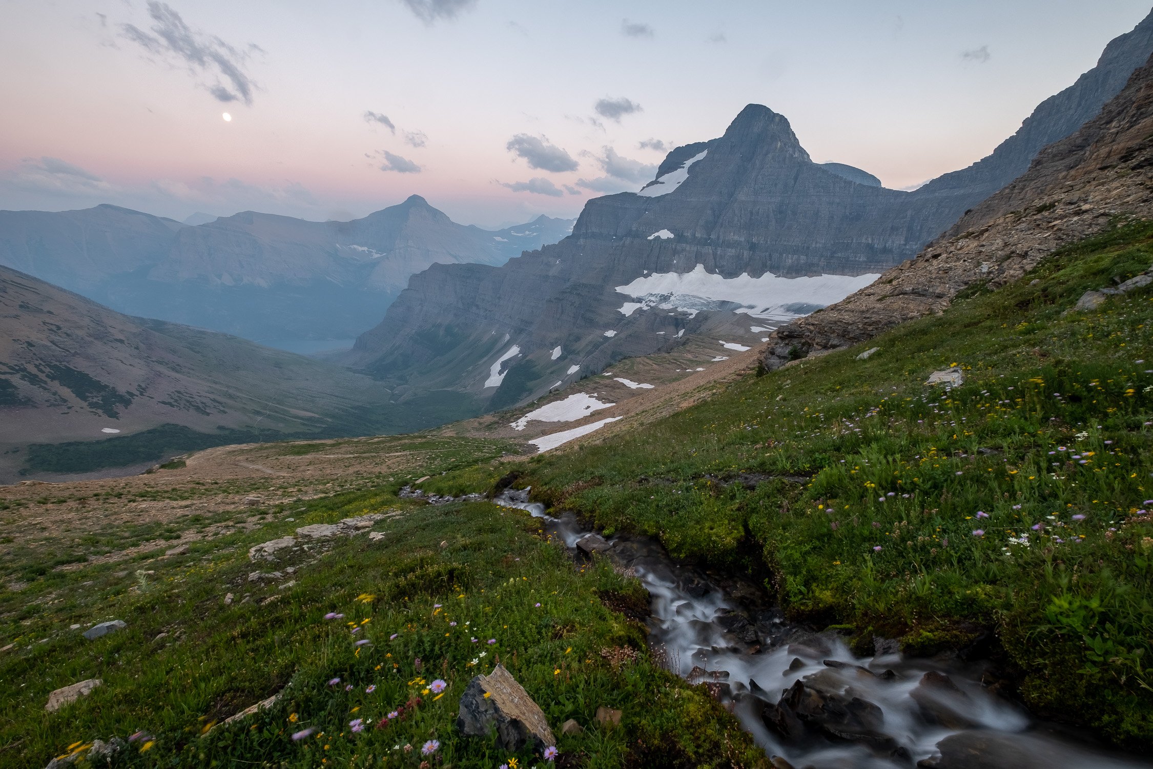  Going-to-the-Sun Mountain from Siyeh Pass during a smoky July sunset in Glacier National Park. 