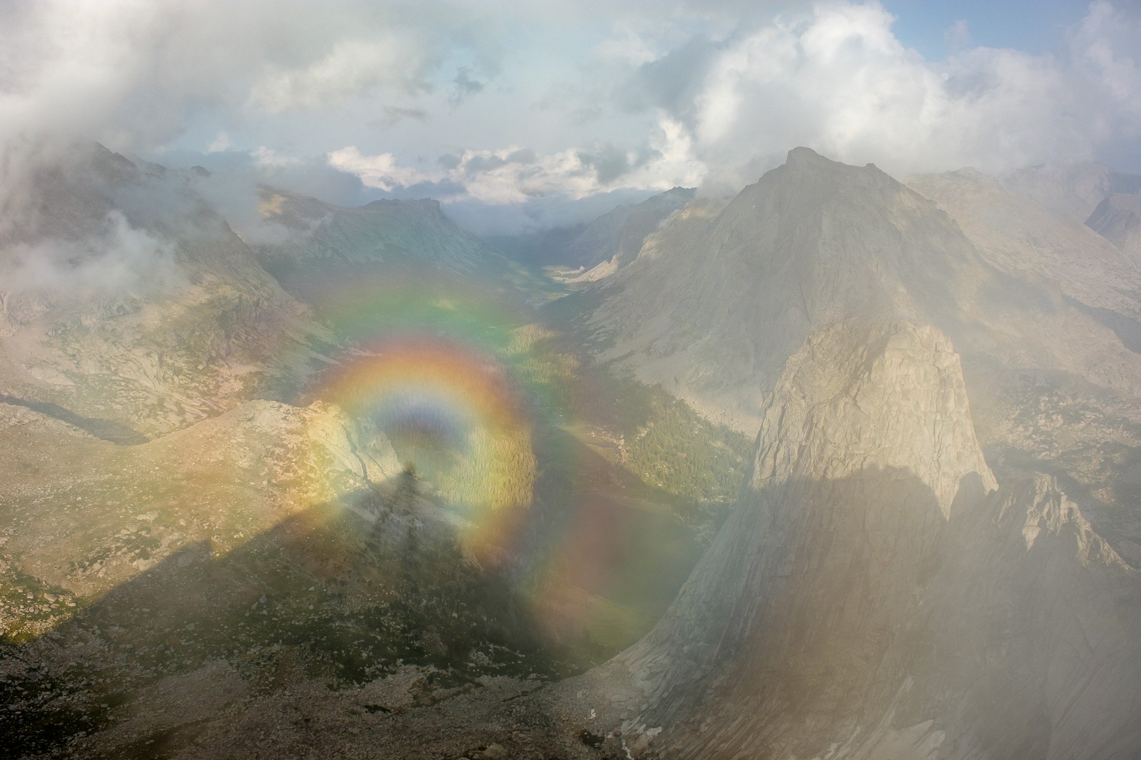  One of the higlights of this trip was watching this spectacular optical phenomenon called a glory from the summit of Bollinger Peak, far above the Cirque of the Towers, after a long day of waiting out the rain. 