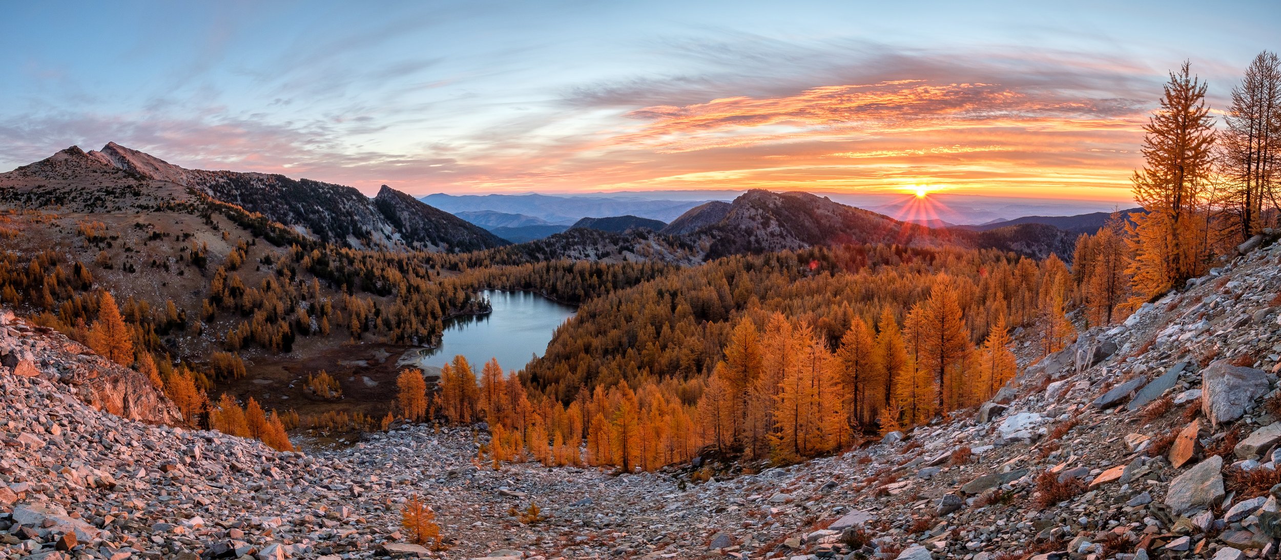  An incerdible sunrise view of Cooney Lake during peak larch color, early October. Sawtooth Wildernesss. 
