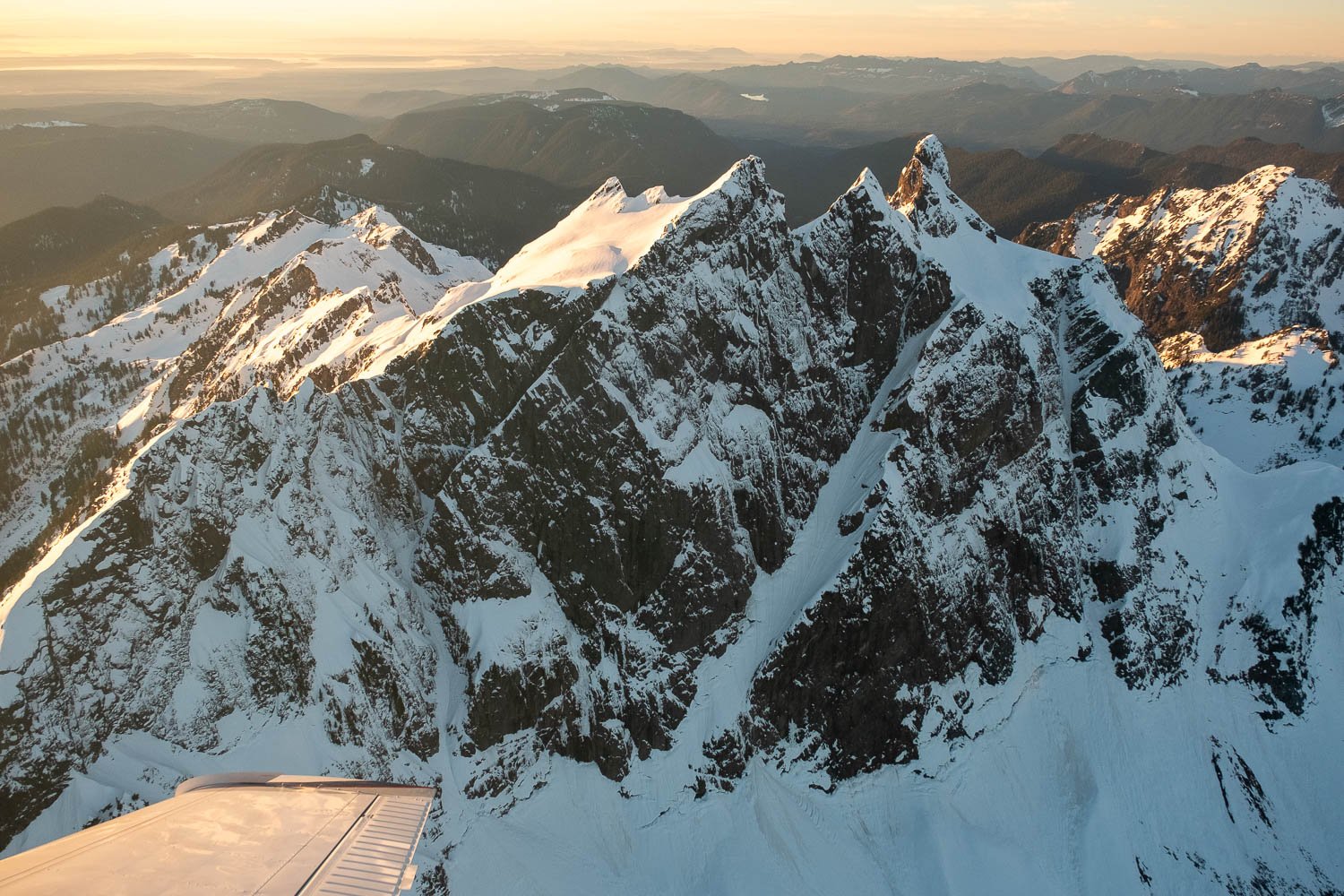  The steep East Face of Three Fingers peak, with the fire lookout barely visible on the south (left) summit. 