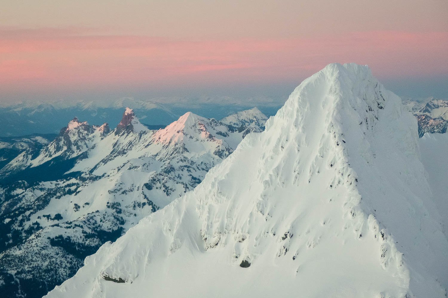  Shuksan's summit pyramid, with Canadian and American Border Peaks at left, along with Larrabee. 
