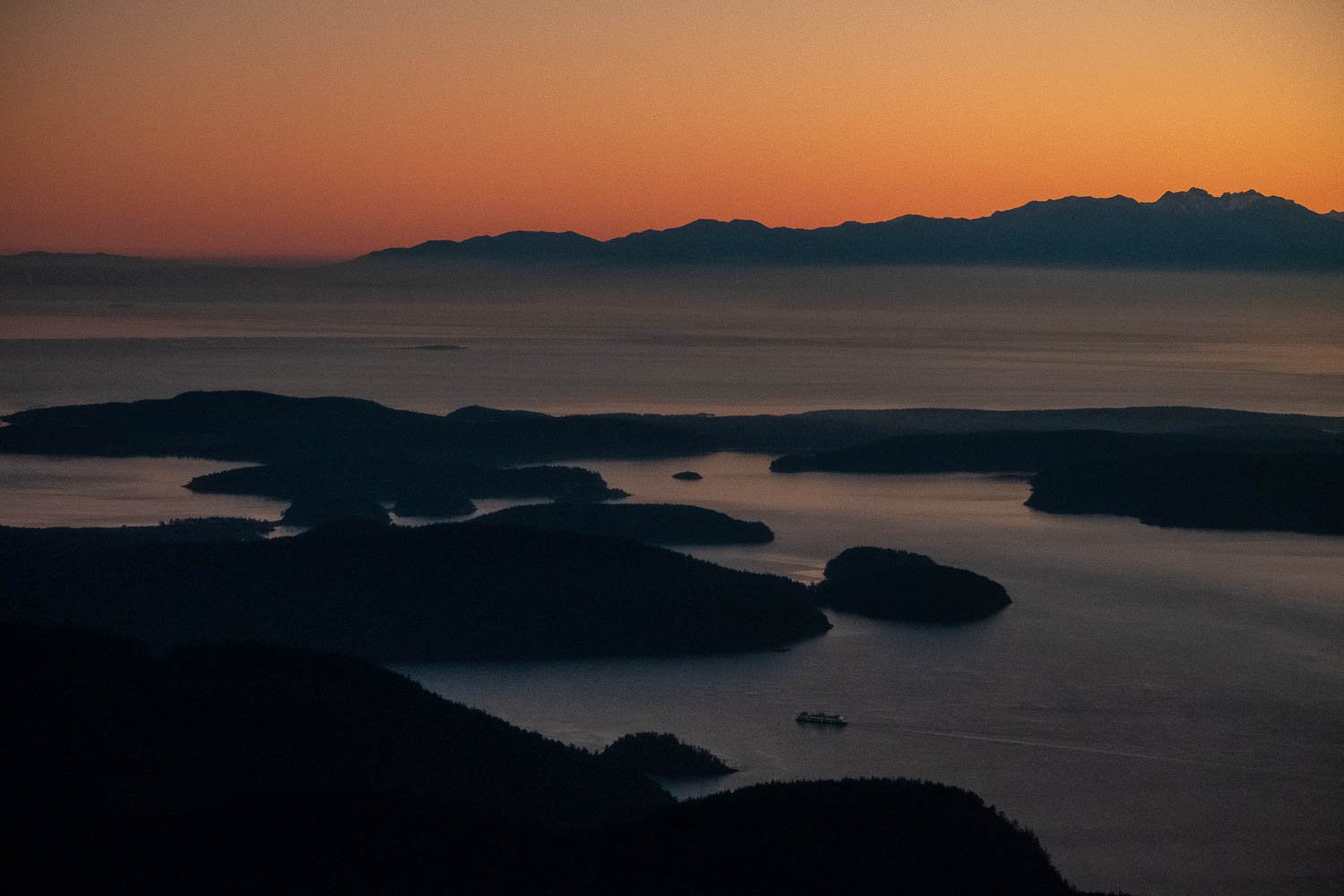  An eastbound ferry about to pass through Thatcher Pass, between Decatur and Blakely Islands. Sylvan Cove is just above (south) of the ferry. 