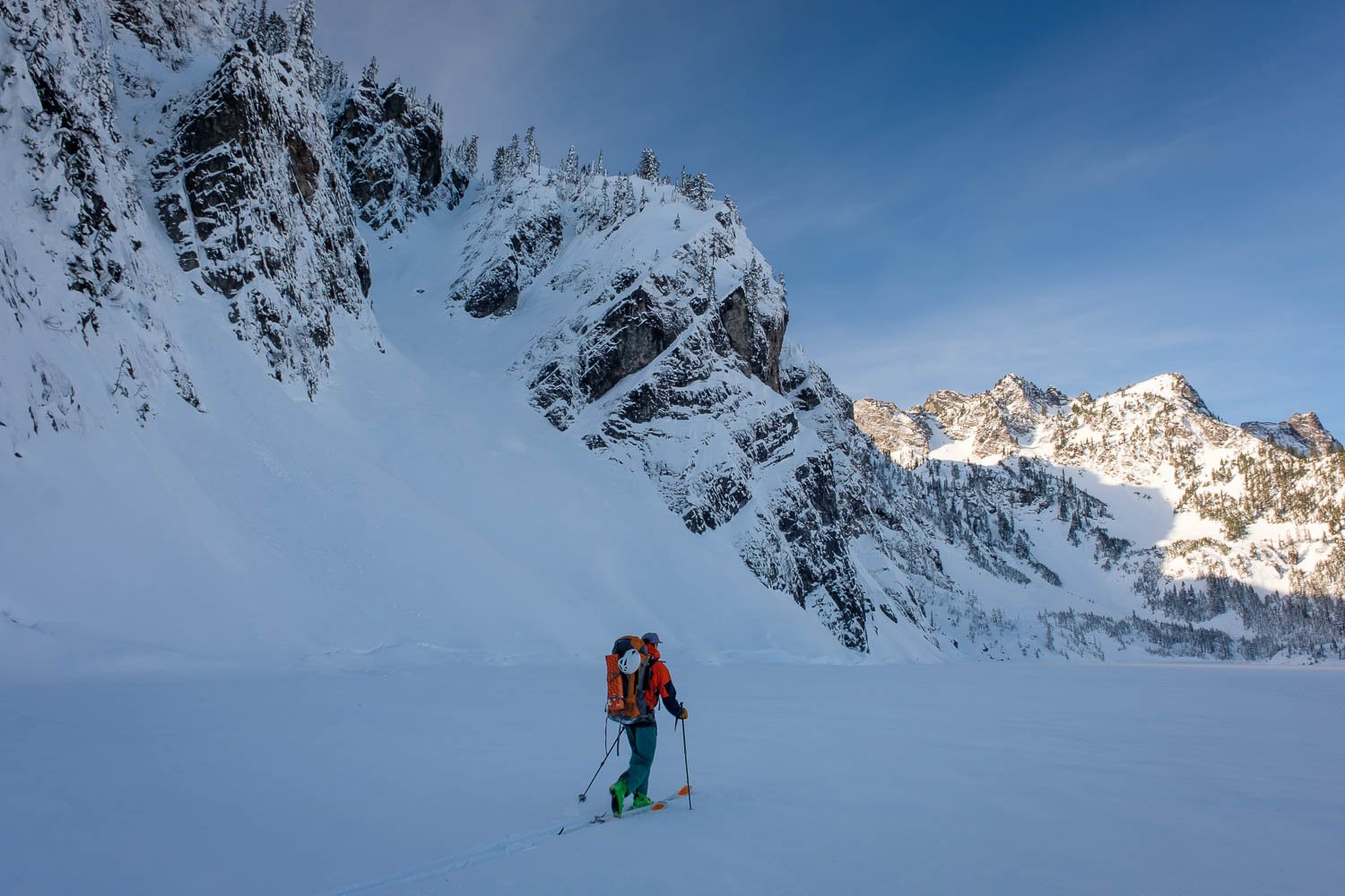  Matt crossing Snow Lake, looking up the Cache Couloir, with Mount Roosevelt at center right. 