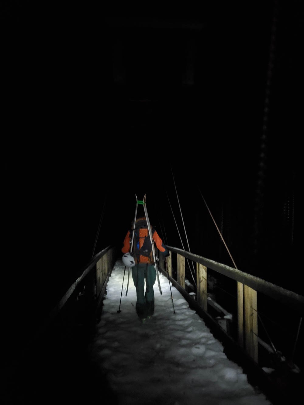  Crossing the Middle Fork bridge in the dark, just moments from the car and dry clothes. 