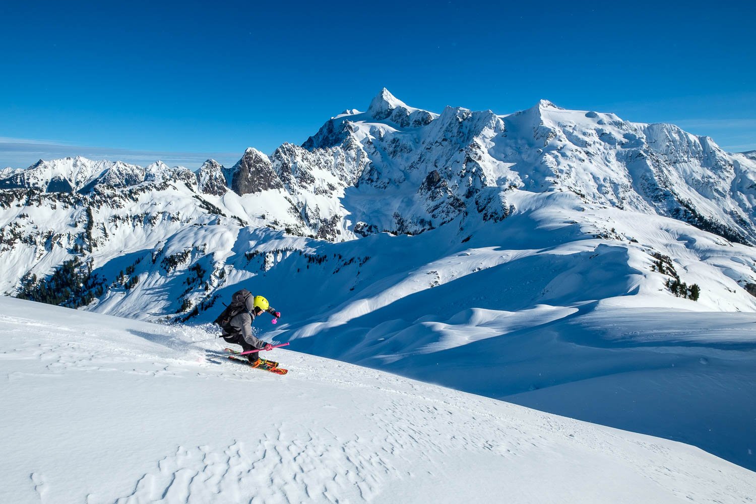  Adam tearin' it up on the blades in the sun with stunning views of Shuksan, January. 