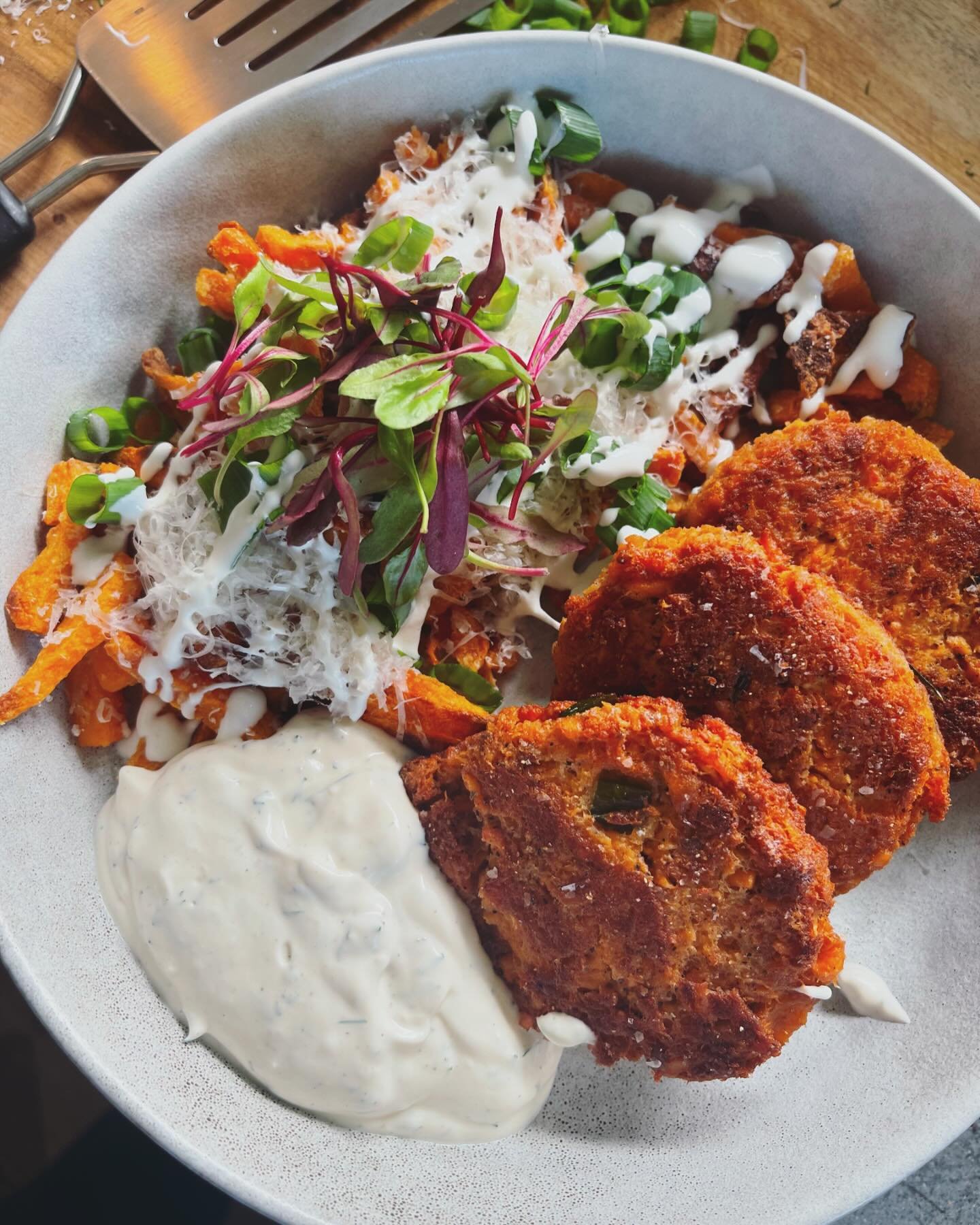 This combination hit the spot!  Sprinkled the Sweet Potatoes with Parmesan, Chives sour cream and Micro greens.  #dinnerideas 

Salmon Patties
@themodernproper 

Dill Dip @themodernproper 

Baked Sweet Potato Fries
@acouplecooks