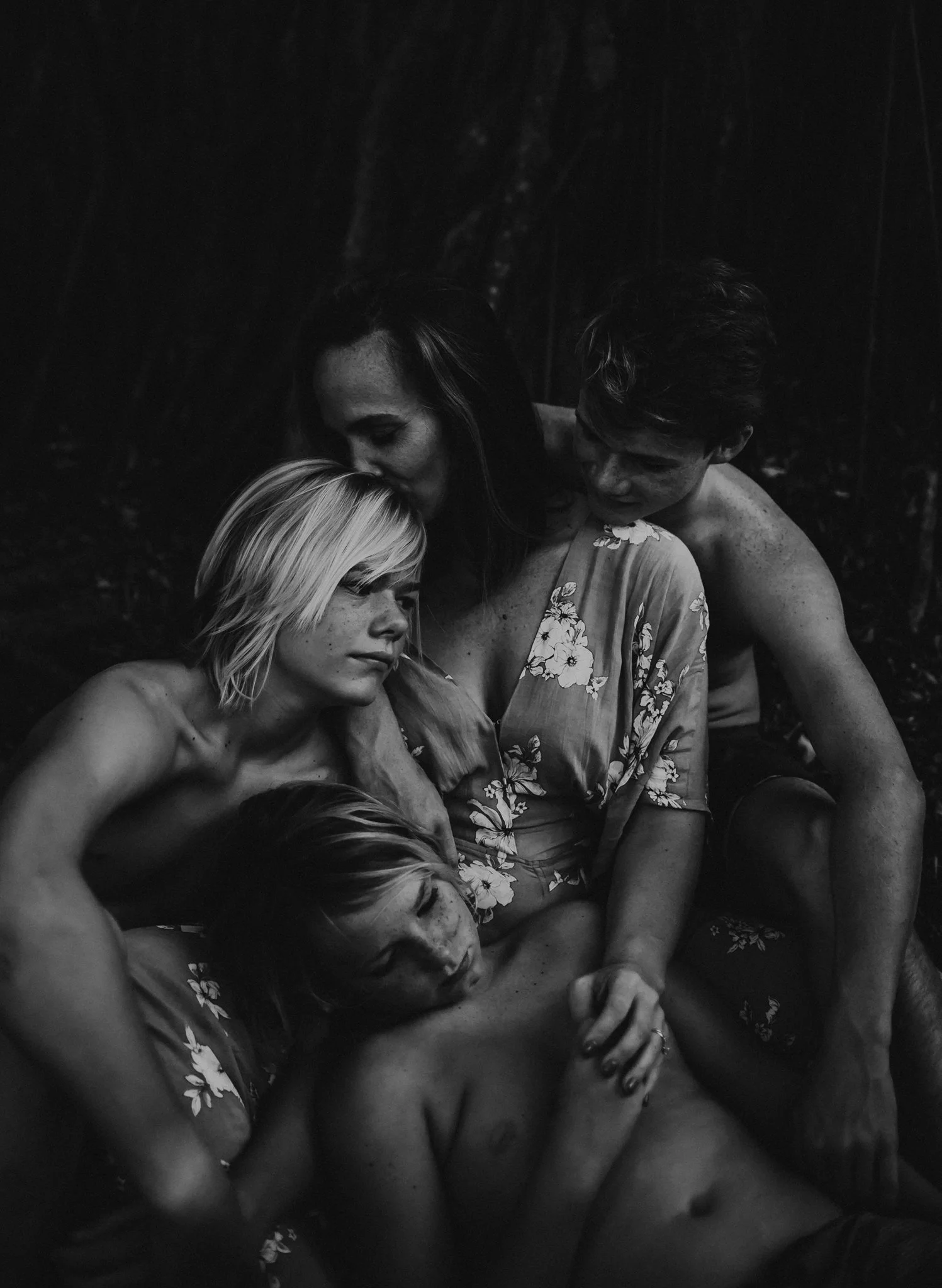 This image by Stephanie Holcombe was taken at a workshop run by the incredible Stormy Solis. Stephanie shared a bit about this family's story with us, "this family is truly inspiring. Their connection, love, strength, beauty. This woman has lost her child - something just unimaginable, it breaks my heart to even think about. These boys have lost their little brother - something I know all too well. I have many favorites from this session, but I am really drawn to this one." Thank you for sharing their story with us Stephanie and for creating such authentic beauty from a moment that was likely very emotional. Your work is inspiring. 
