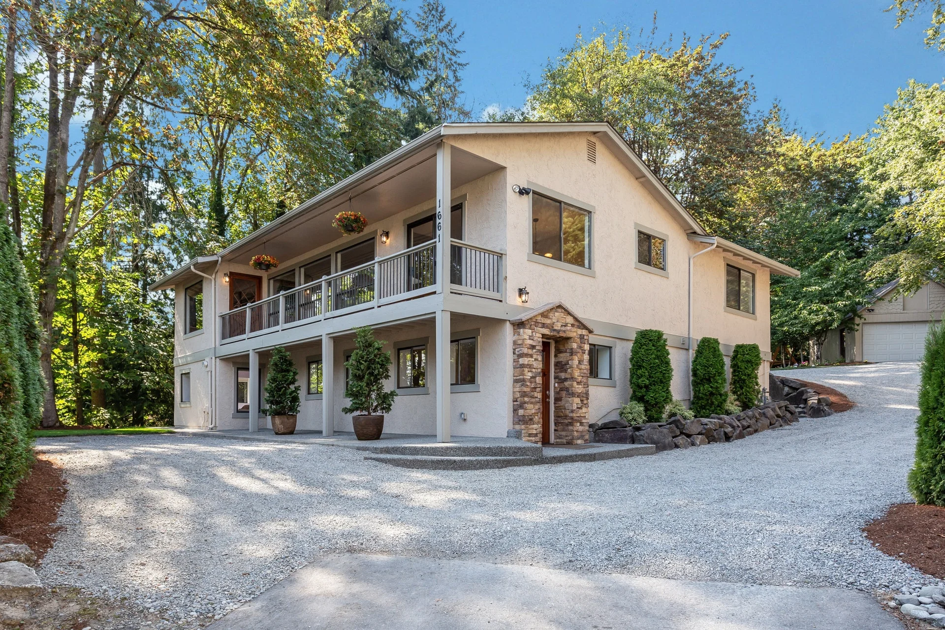 SOLD! Custom daylight rambler in Bellevue for $910,000