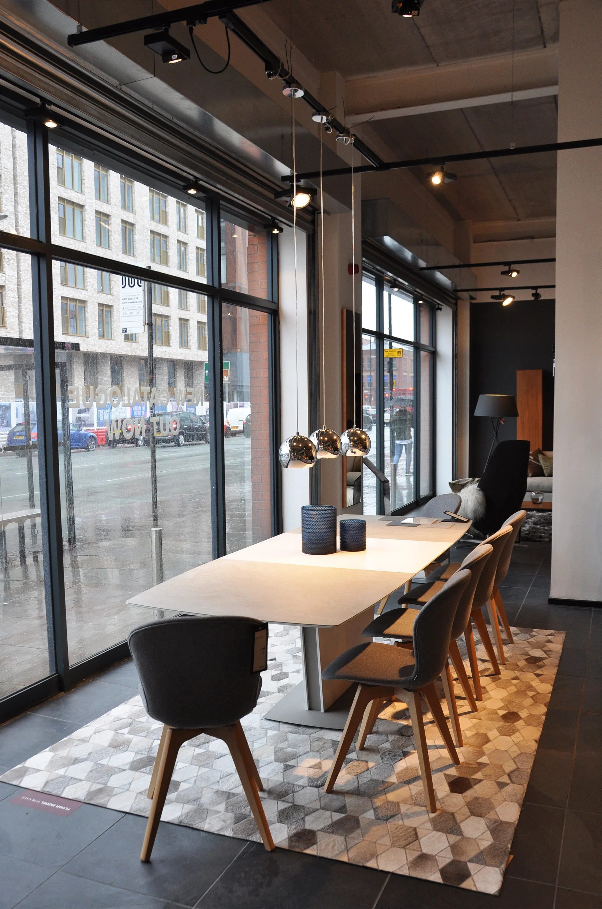 Milano table , Adelaide chairs , Tait rug, Ball pendants .