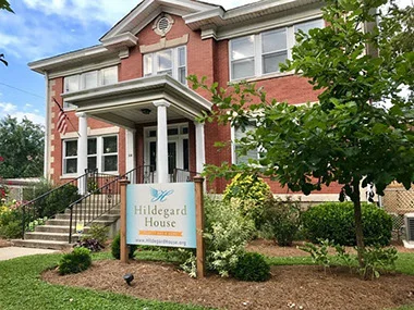 “We are, with the help of our community and our volunteers, the only place of emotional, spiritual, and social support for a dying person who otherwise has no home or loved ones to care for them. The services at Hildegard House are designed to help support the quality of living throughout the dying process. We believe every moment matters and strive to provide a home setting with comfort and support while respecting the dignity of every resident. Every resident has access to a hospice team which is composed of a nurse, a nurse’s aide, a social worker and chaplain. Meals, laundry, housekeeping and companionship are a part of the home setting at the Hildegard House.”