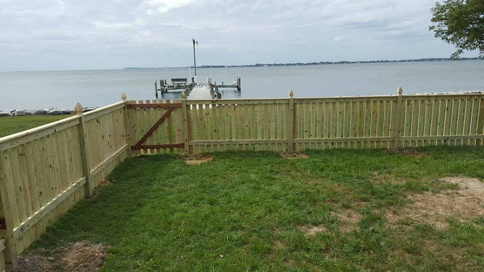 Wooden Fence around a Yard