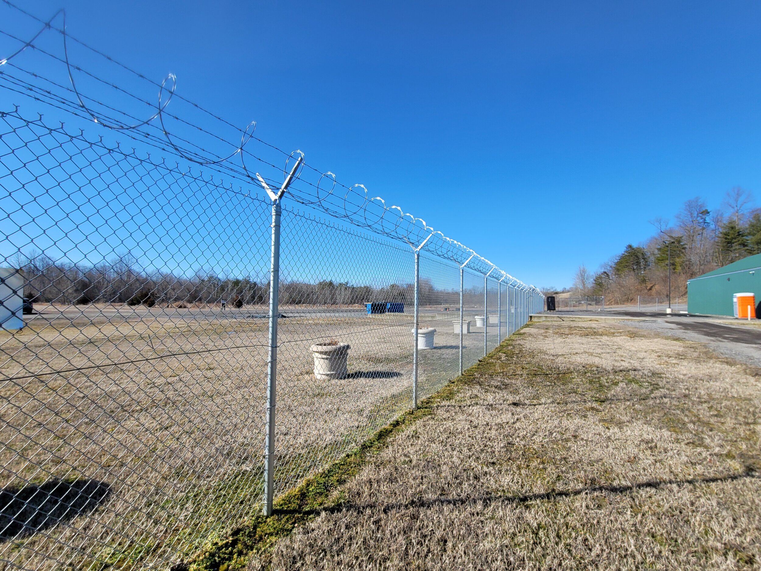 Chain Link Fence with Barbed Wire