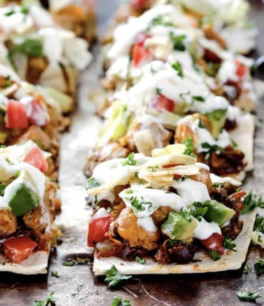 Sunday's Special is a Southwest Chicken Flatbread Pizza with Black Beans & Guac