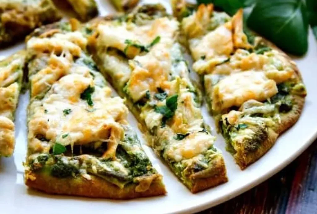 Sunday's Special is a Cheesy Chicken Pesto Flatbread Pizza with Roasted Garlic.