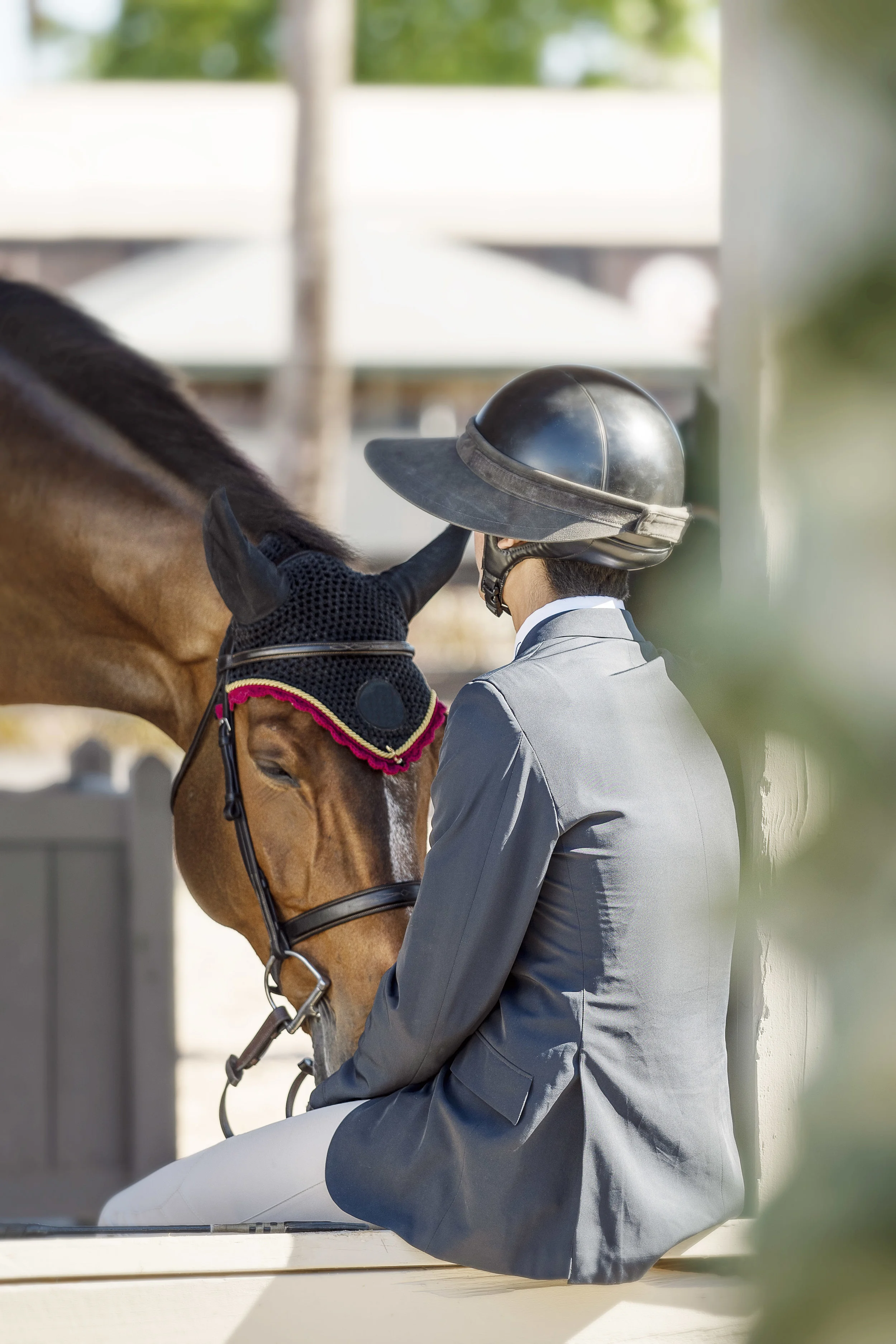 A quiet moment between horse and rider.jpg