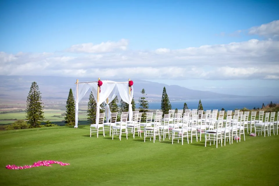 Kahalawai Terrace is one of our beloved outdoor ceremony locations. It features the most spectacular views, as far as the eye can see. You'll feel as though you're on top of the world. It's private setting, overlooking Haleakala and both the north and south shores, makes it the perfect place to join in matrimony. Capacity 150 Includes up to 40 White Padded Chairs In Conjunction with Reception $800 Cermemony Only $1200
