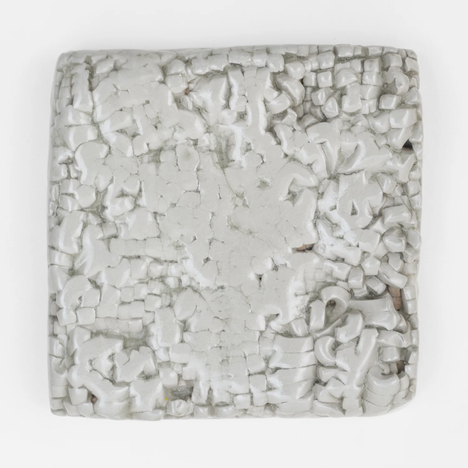 Untitled, 2012. Porcelain, transparent glaze. (5.75 x 5.75 x 1.75 inches)