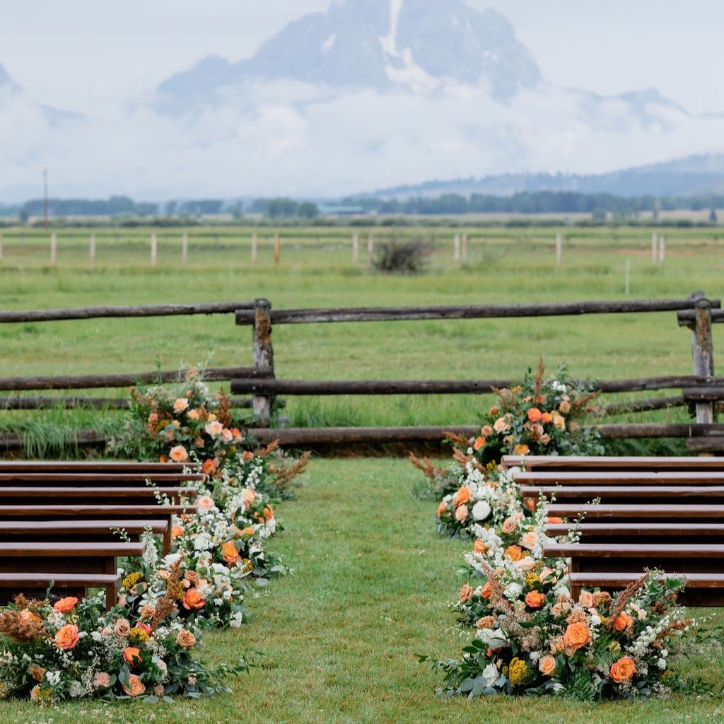 Aisle views from @diamondcrossranch

G + T details I absolutely love textured bouquets to match floral patterned dresses. 
Event planner @wildrosejh 
Photography by @jamye_chrisman 
florals @plushfloral 
Venue @diamondcrossranchweddings
