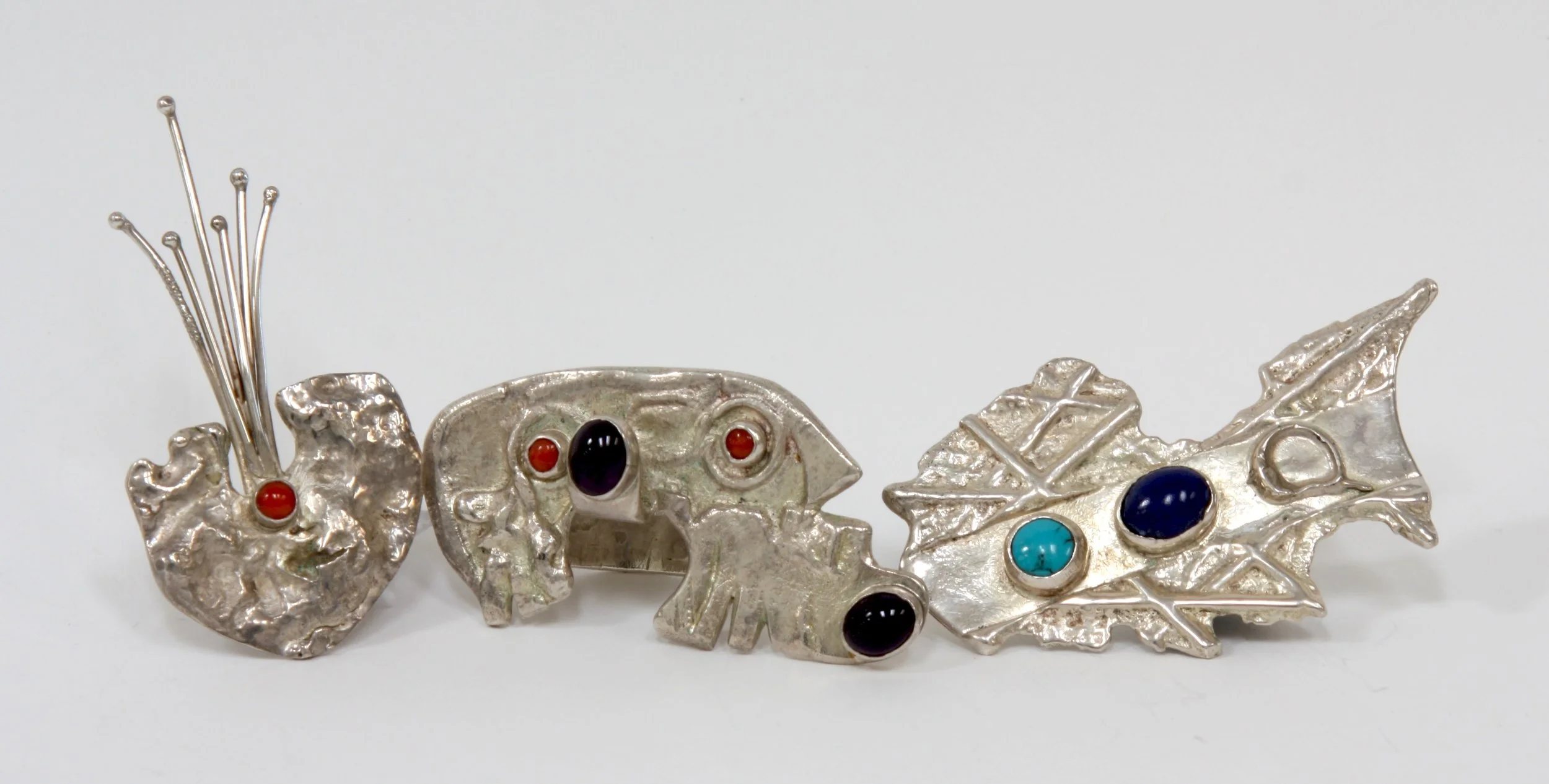 Three Broaches
