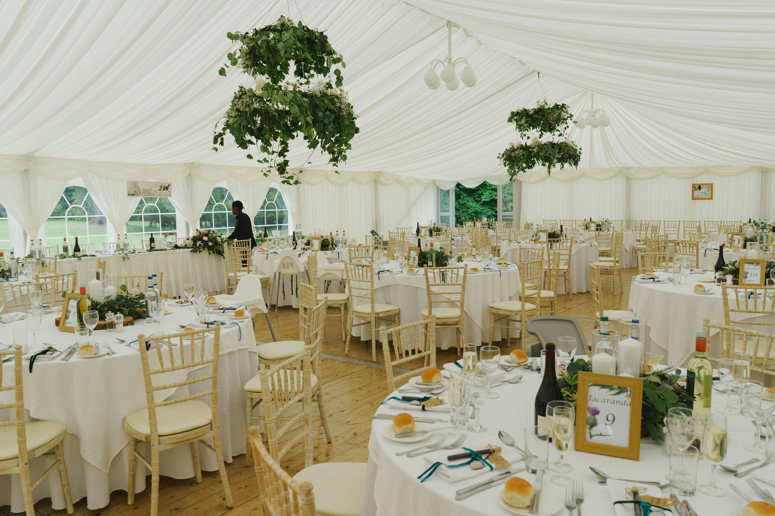 Marquee wedding at Strathallan, Perthshire with eucalyptus and foliage installations