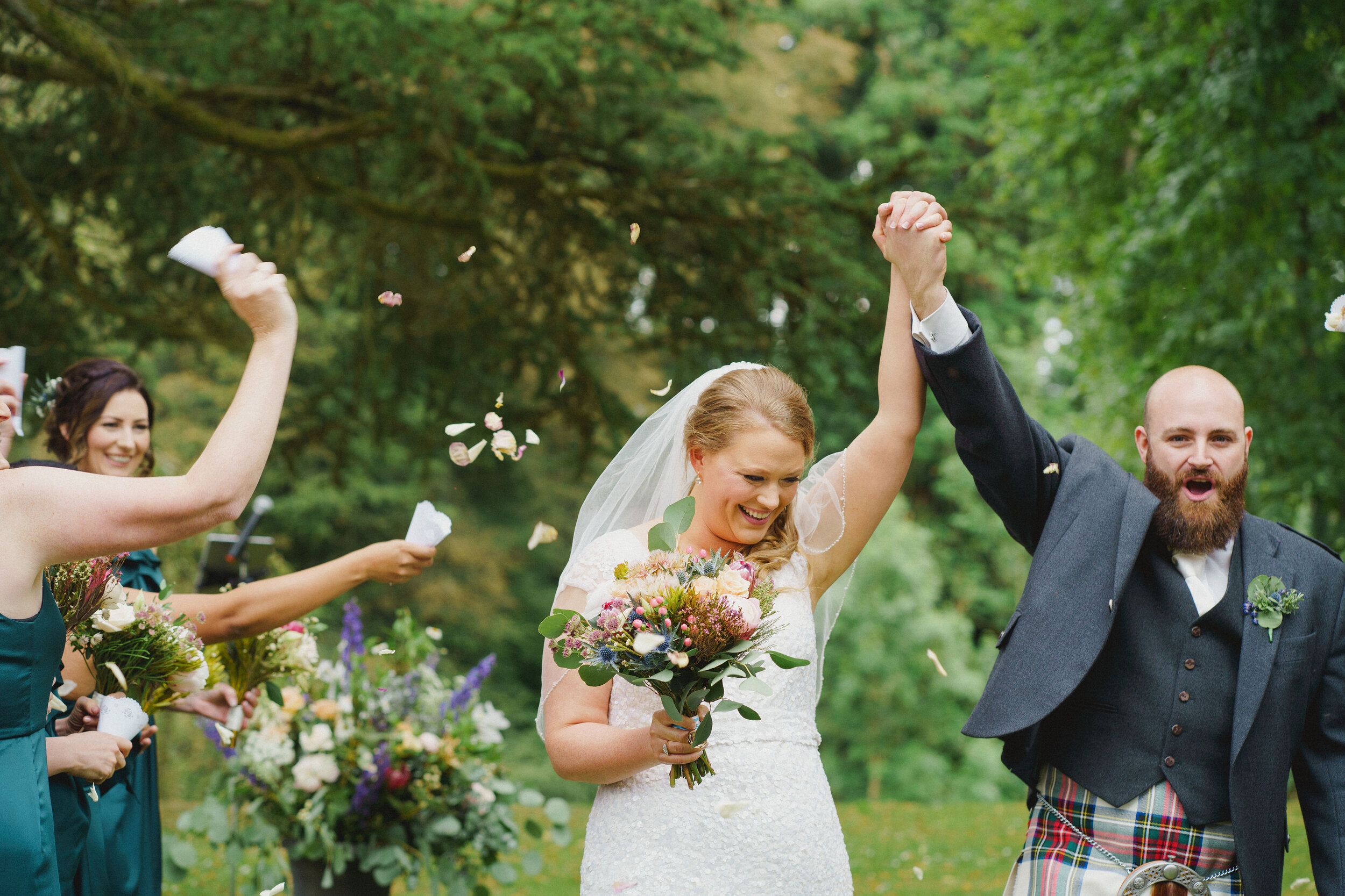 Confetti throw of bride and groom at Strathallan Castle, Perthshire.