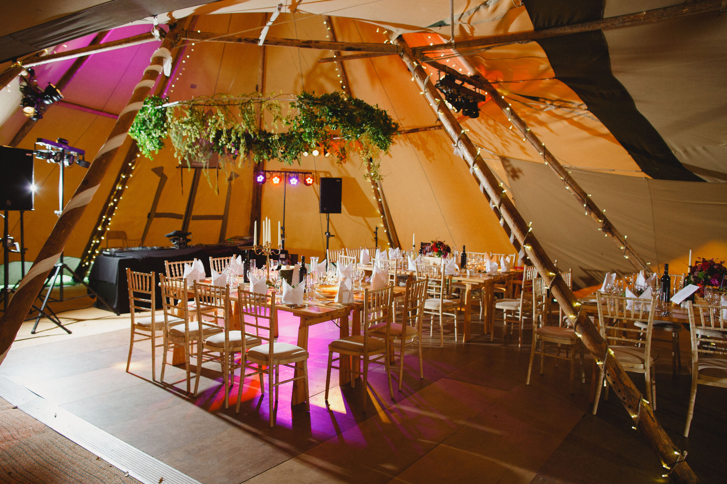 Wedding Teepee styled with large suspended hoop of foliage at Carphin House, St Andrews