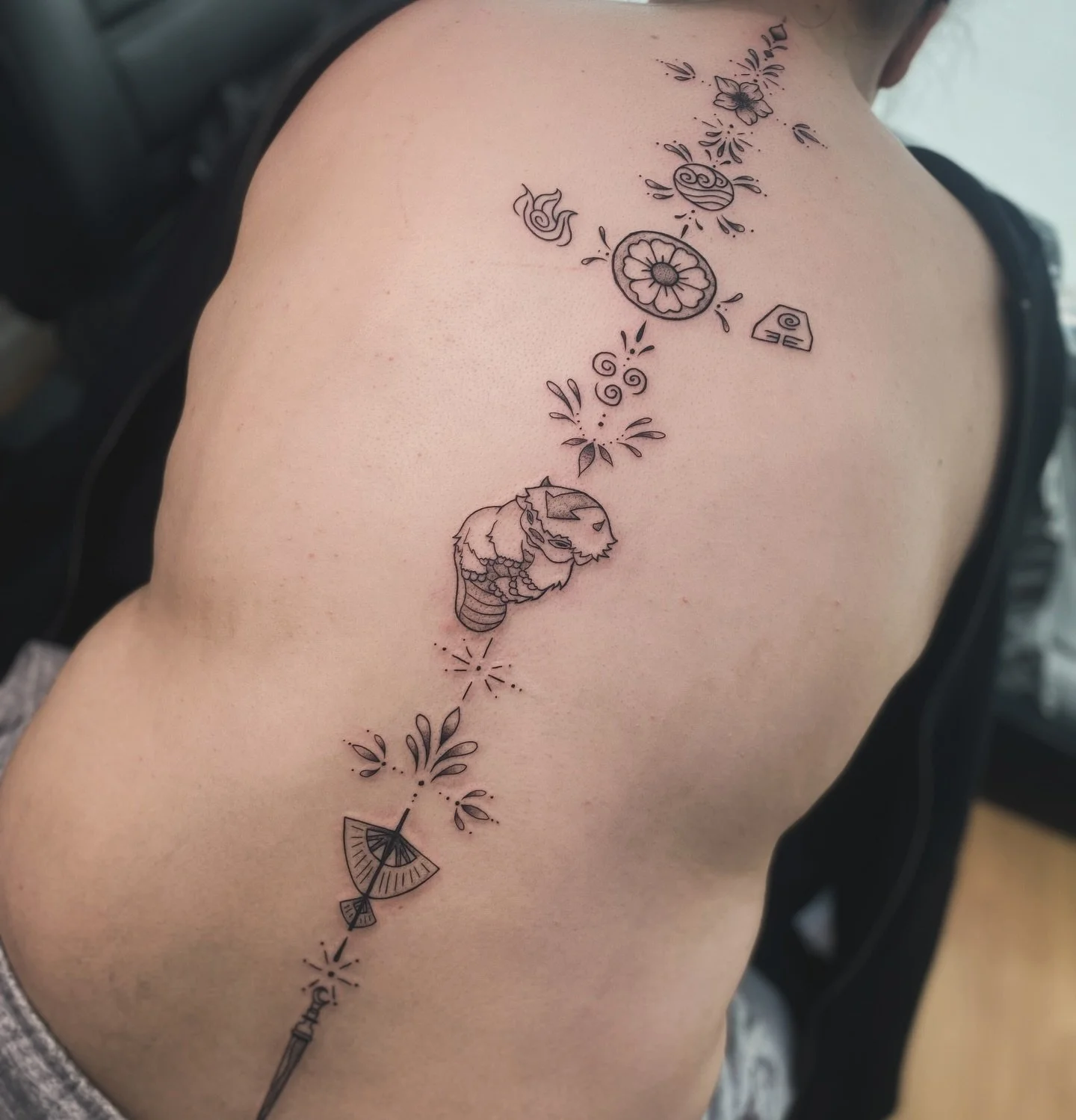 Sweet little #avatarthelastairbender inspired spine piece for Chloe!
💧🪨🔥💨

⚡️done at @infiniteworldstattoo 
✨ done using @aftercare_collective 
.
.
.
#tattoo #tattoos #tattooapprentice #adelaide #adelaidetattoos #adelaidetattoo #avatar #avatartat