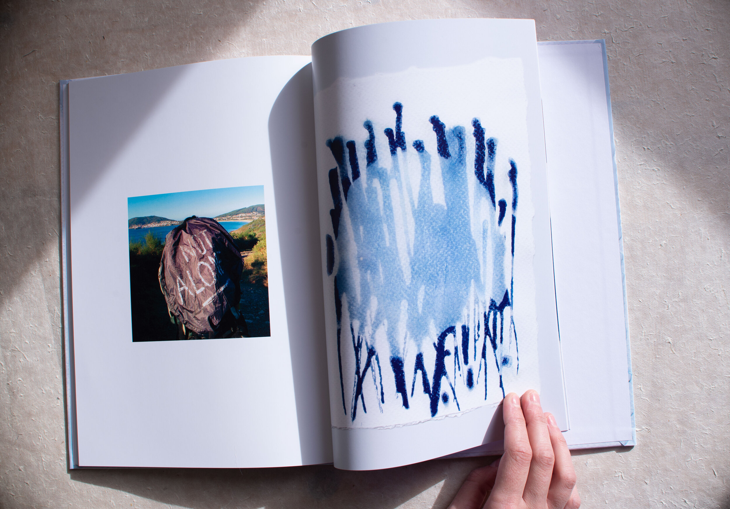   Artist book. 2018   This artist book consists of a compilation of cyanotypes I made during my pilgrimage of 500 miles from Madrid to Muxía, the last stop of El Camino de Santiago, Spain.  The images are shadows of elements I found on my way while I