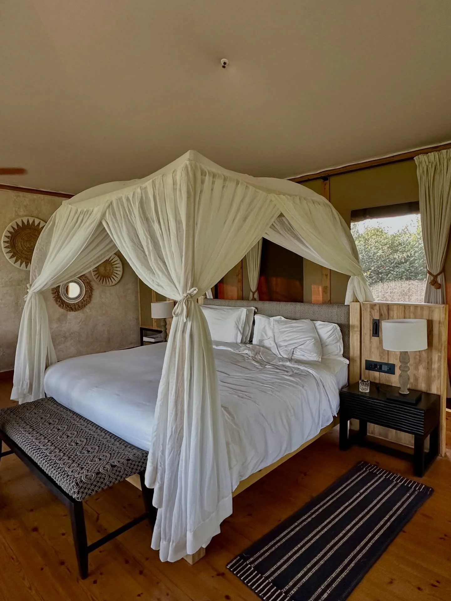 At JW Marriott Masai Mara Lodge, glamping means beautiful tented suites along the Talek River &mdash; all the adventure of the Masai Mara, with real beds, great food, and serious comfort.

You fall asleep to the sounds of the wild&hellip; and wake up