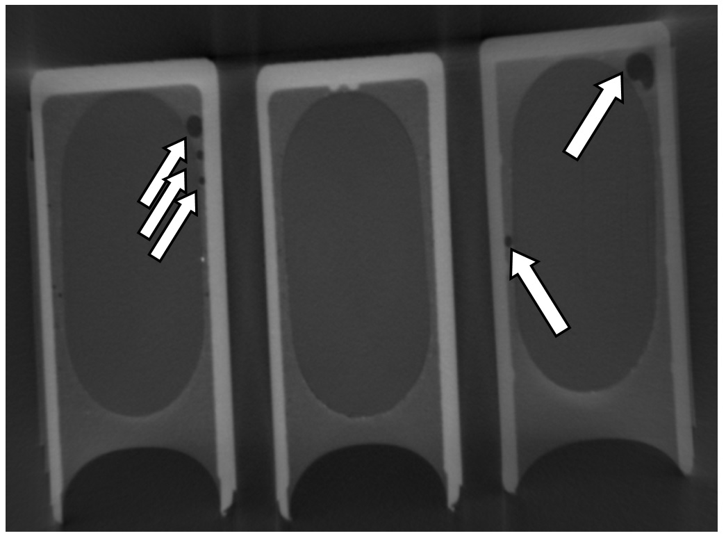 Xray tomography of capactiors showing defects in the encapsulation.jpg