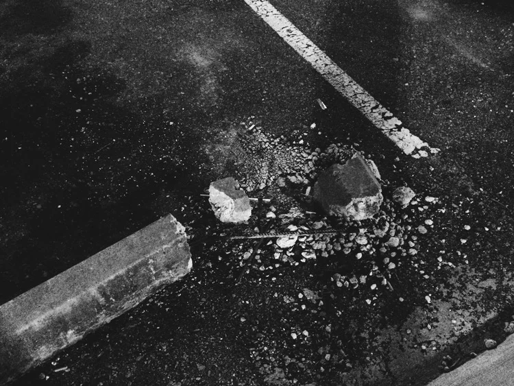 WHY ARE YOU SMILING? I'm sorry I don't find anything funny anymore The tranquility was so simple until (god) slammed the dark blue door The red white and yellow American flag flies like a wandering vulture Once all the dead have been devoured, she nests, fat belly bending the branches of the tired willow Weeble wobble wallow