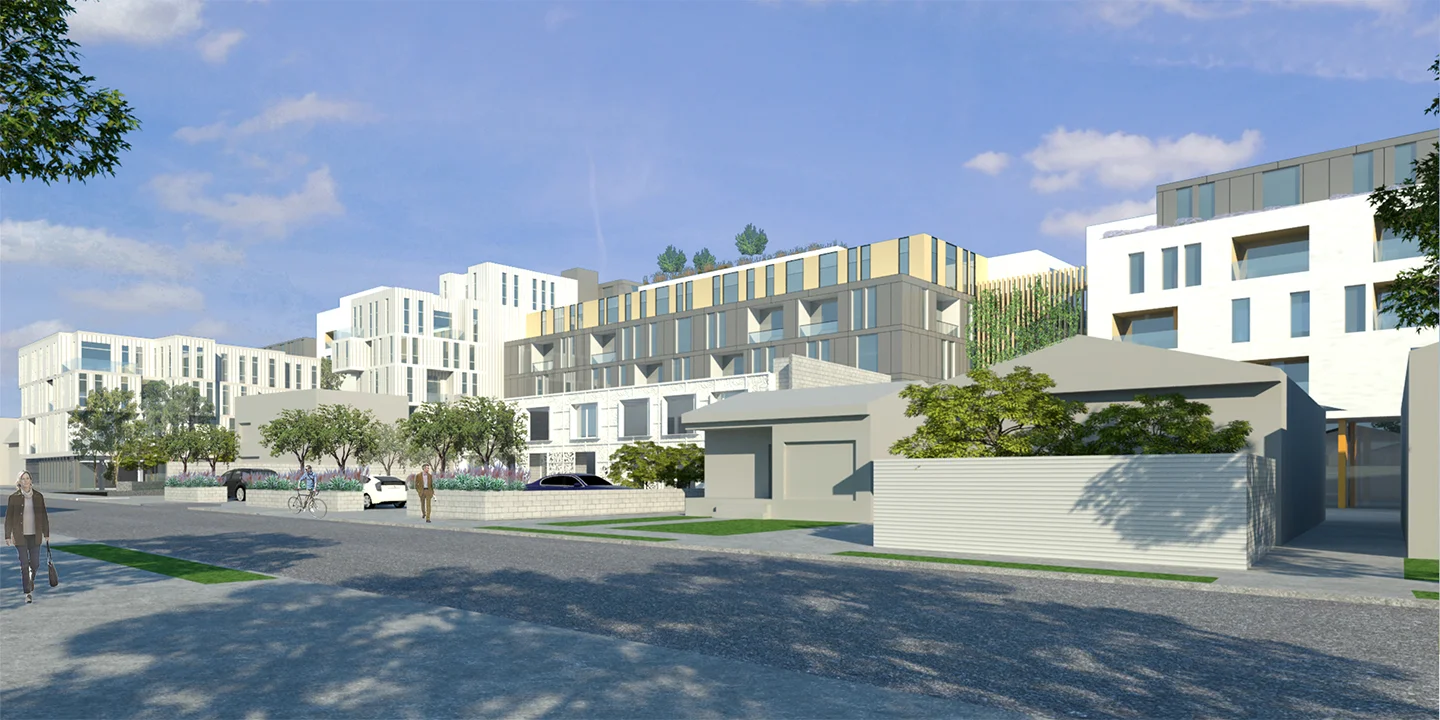 The street view along Beach demonstrates the scale-breaking strategies used to create harmony with lower-scale structures in the area