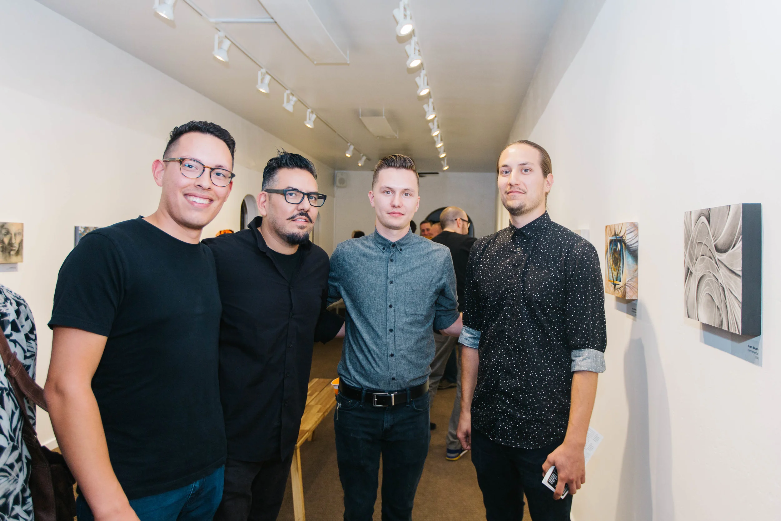 Artist Collin Williams with gallery owners Joseph Gonzalez, Regan Jericho, and Christian Uriah. 