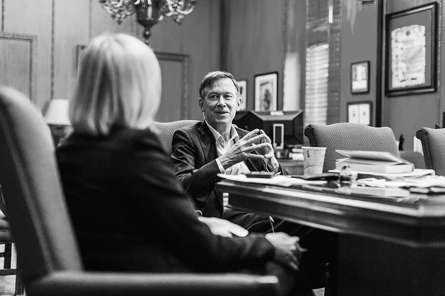 Governor Hickenlooper chats with S+B Publisher Robin Brown in the governor’s office at the State Capitol in Denver.