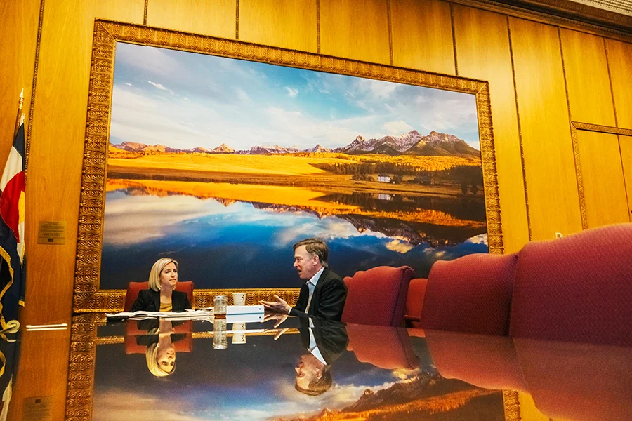 The photograph on the wall in the governor’s office was gifted to the state by well-known Colorado photographer and environmentalist John Fielder, who presented the governor with a five-page letter just before his inauguration, stating the many reasons Hickenlooper needed to be a pro-environment governor. He keeps the letter in his desk at all times. The photo was taken at Last Dollar Ranch, Sneffels Range, San Juan Mountains, near Ridgway, Colorado.