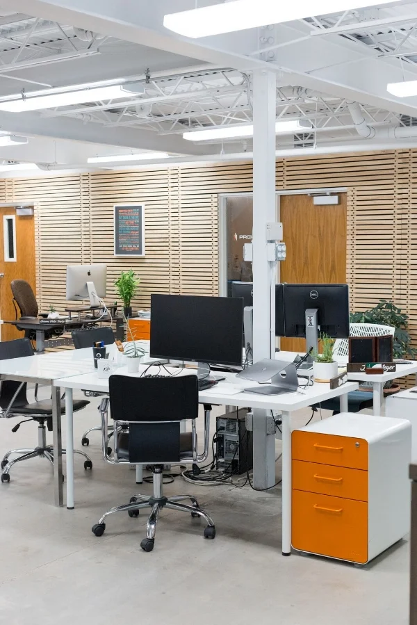 Coworking arrangements can include common spaces, dedicated desks, and private offices. / Photo by Cat Mayer