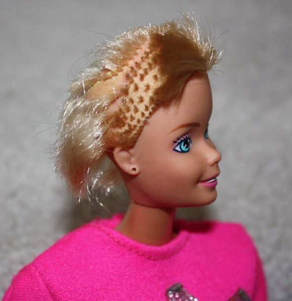 barbie with hair cut off