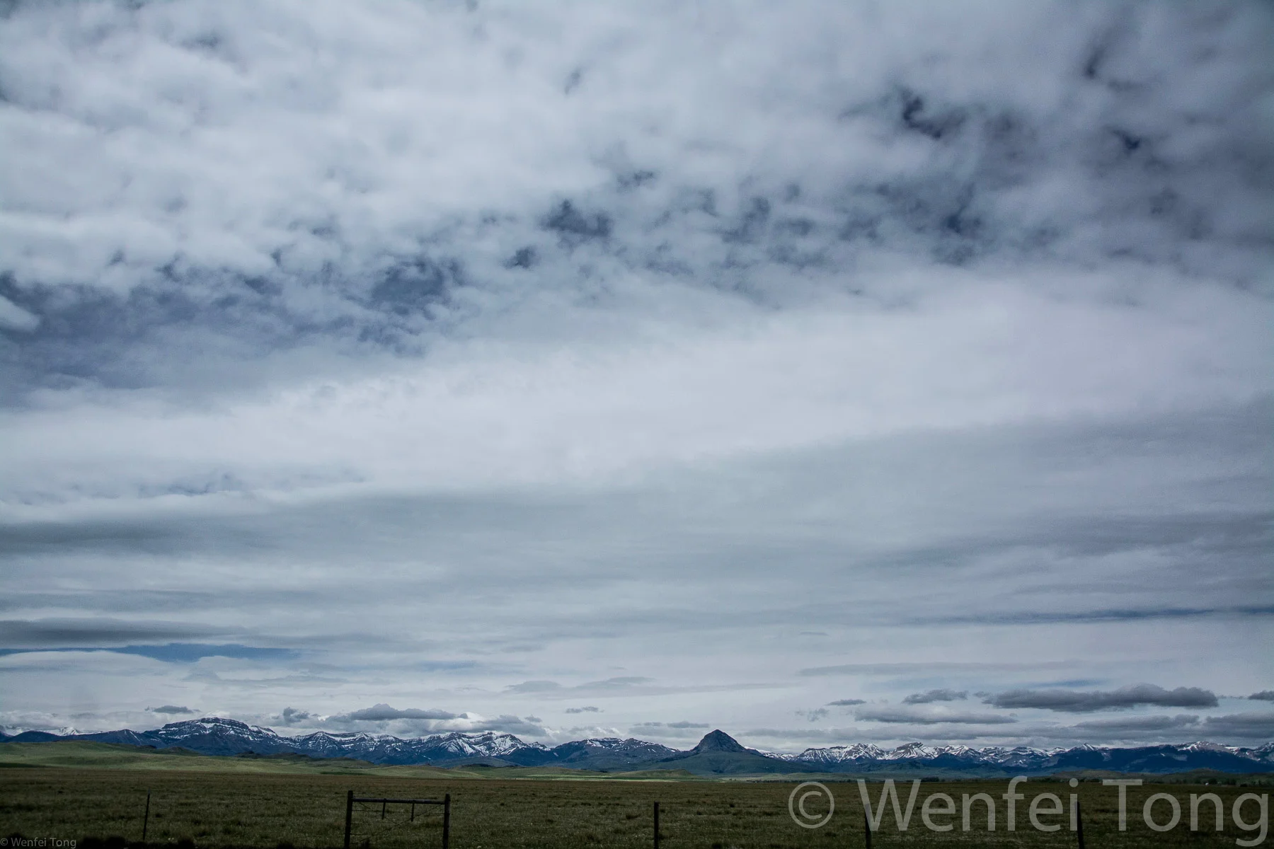 View from the car of the Rocky Mountain Front near Choteau, MT
