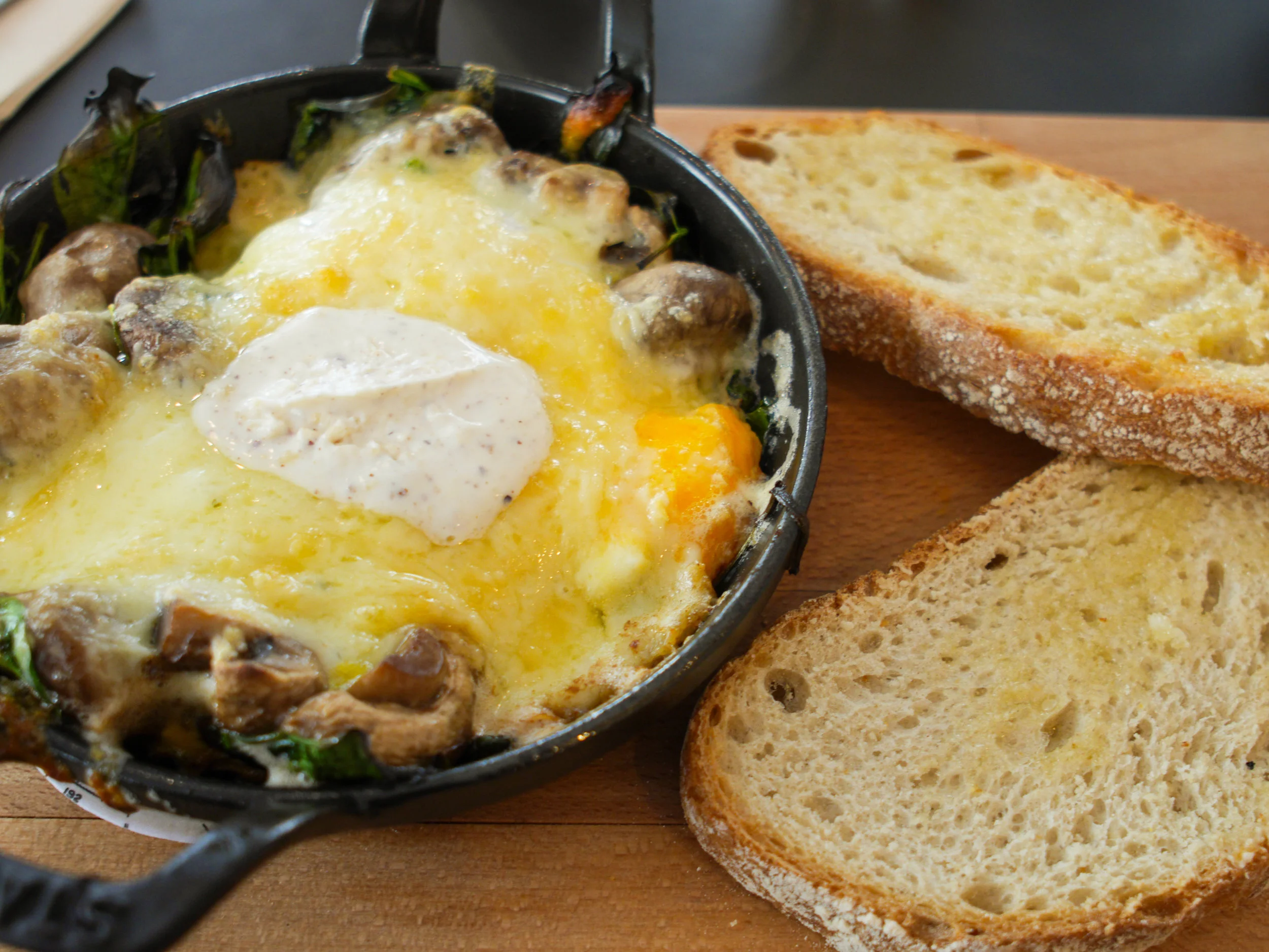 the eggs (free-range, oven baked, with toast) with the mushroom at Federal Cafe in Madrid, Spain