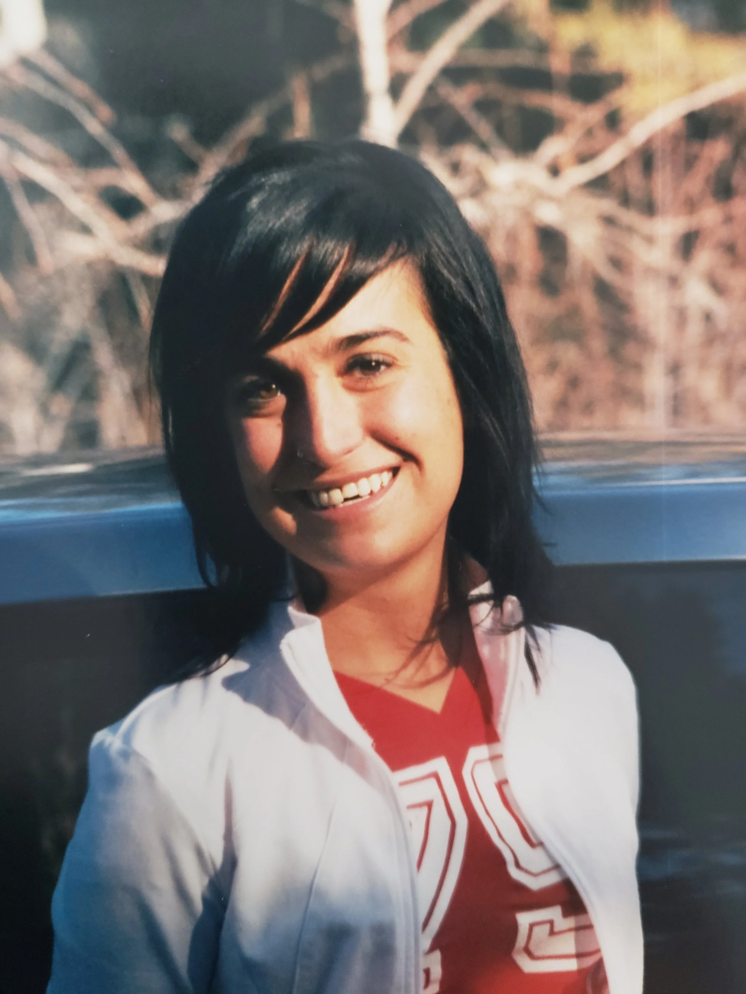 Me after the car wreck with my very small ”Chiclet” looking tooth that BEFORE I got my veneers and permanent teeth in. I was only 16 or 17 in this photo and I remember being so embarrassed by my smile- This is a RARE photo of me showing teeth after the accident.