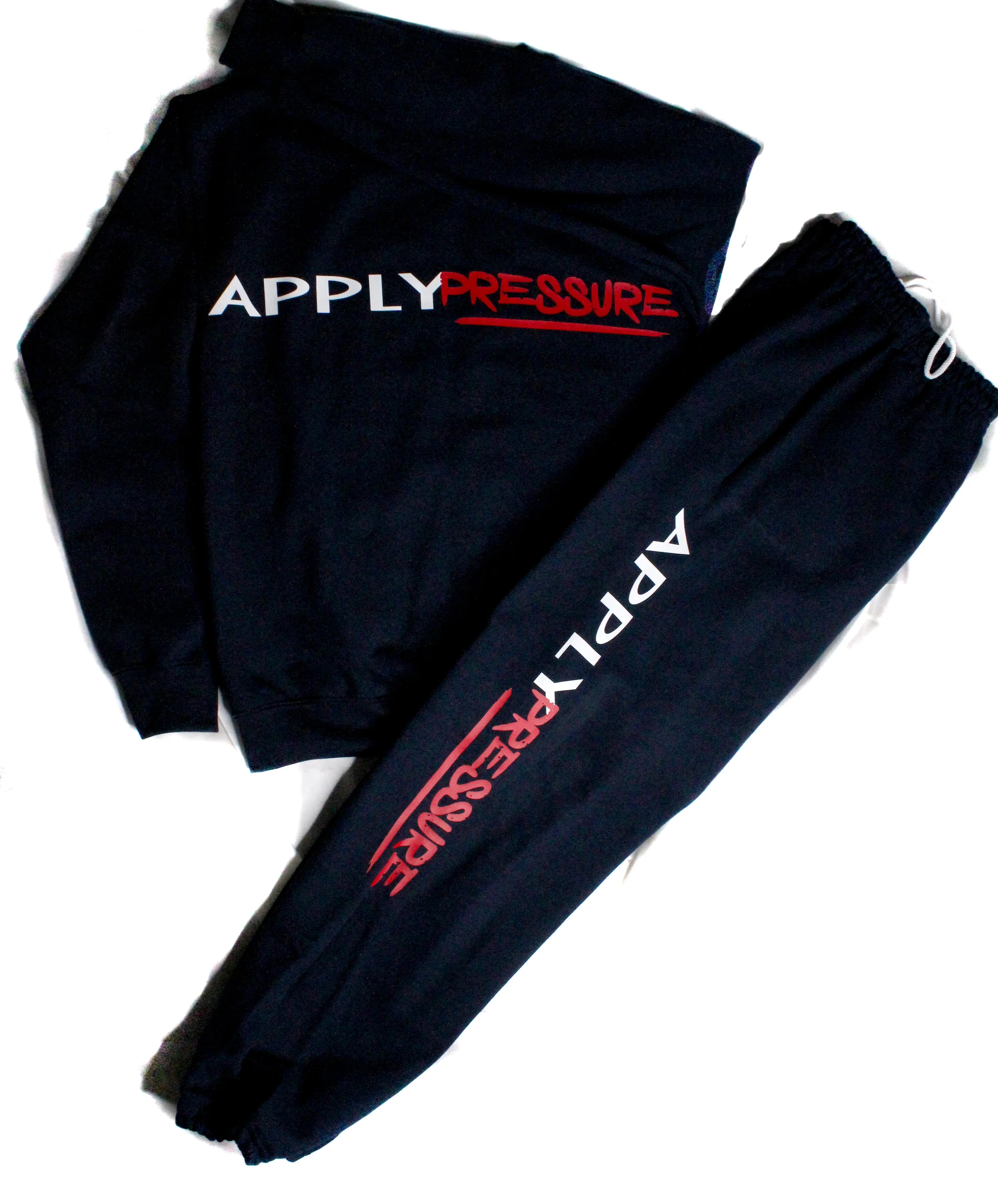 "APPLY PRESSURE" JOGGING SUIT