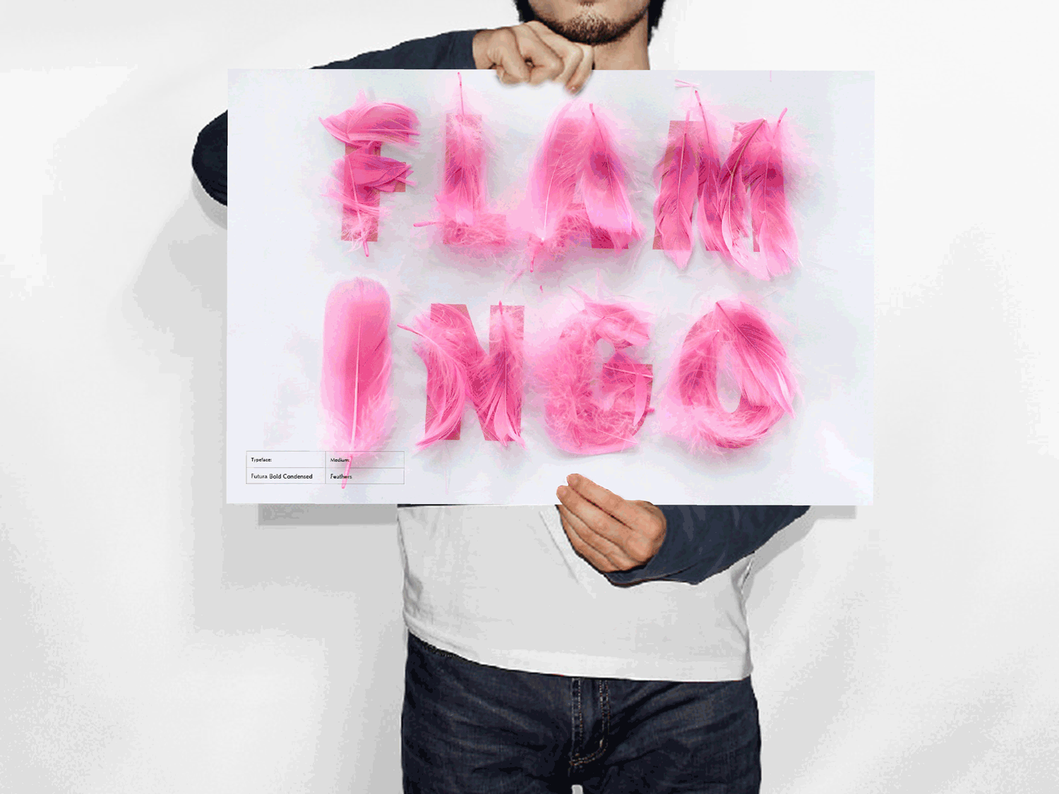 man_holding_paper_mockup-3.gif