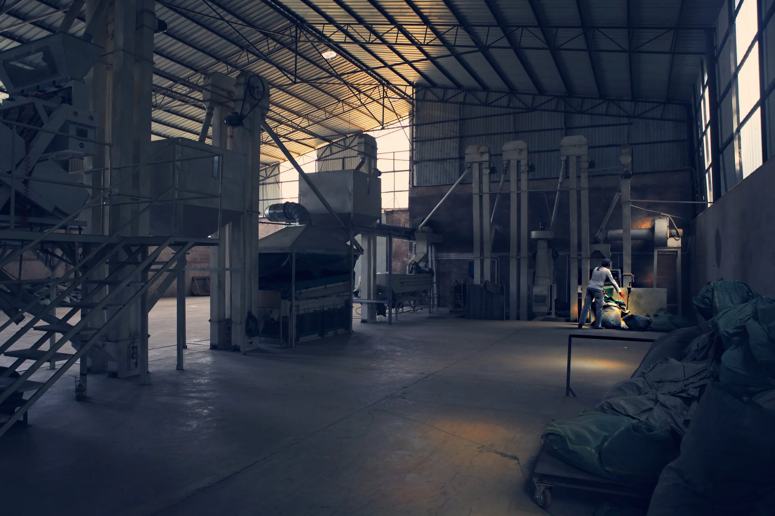 coffee Processing and bagging factory. ( In the photo: Tim, CEO of Yunnan Coffee Traders)