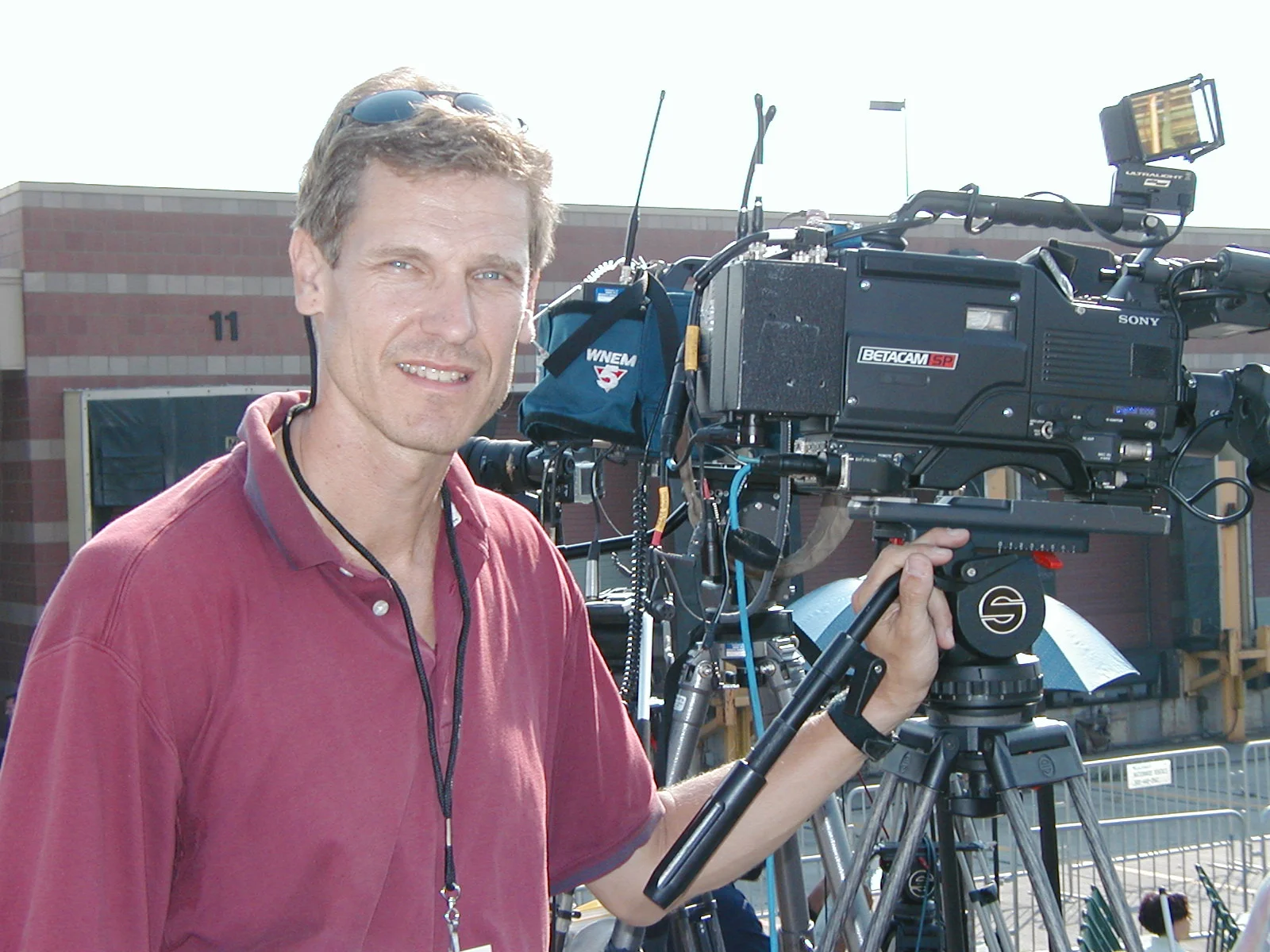  PSvideo (OLD)  This is a fairly ancient picture, those of you who recognize the camera next to me might be able to figure out in what era this picture was taken. (It's a Sony BVW-D600, the Cadillac of its era.)&nbsp; For starters I was at an event f