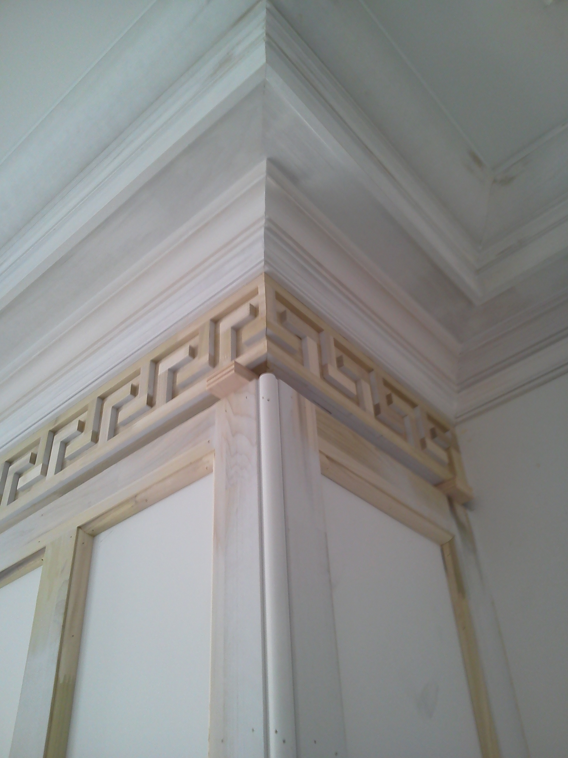 Corner View of the Greek Key with Crown Molding Above