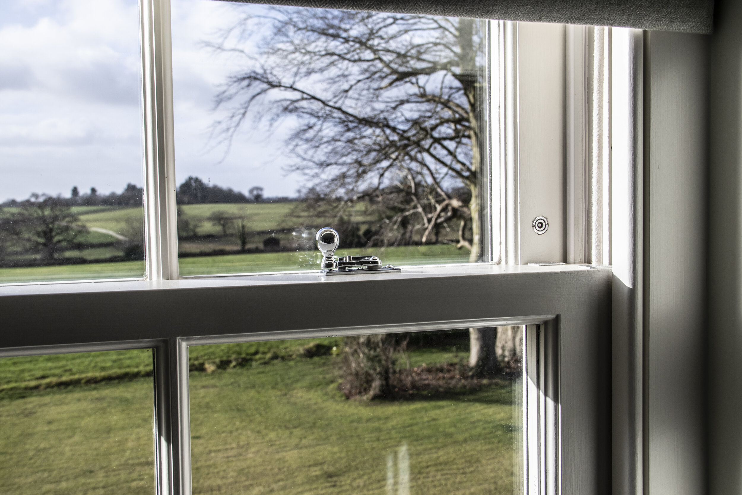 Chrome Hardware on Sliding Sash