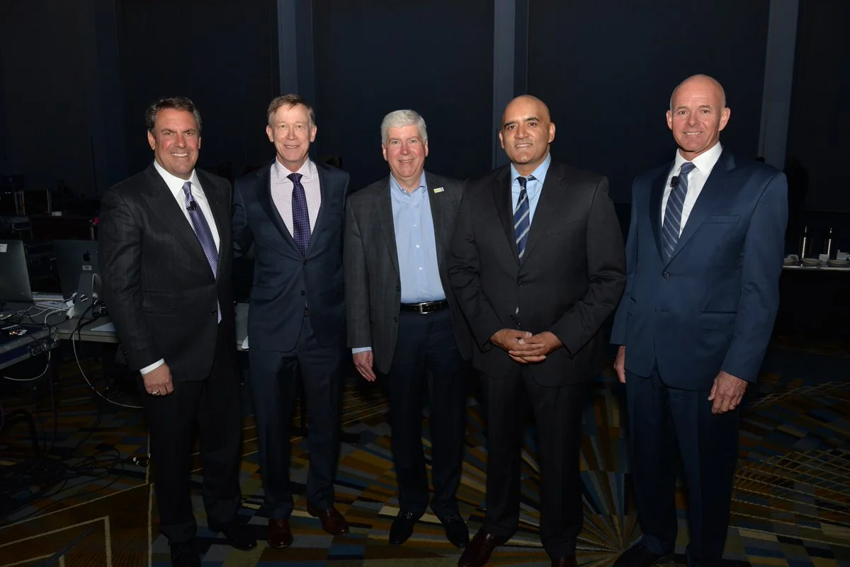 Mark Reuss, EVP General Motors; Gov. John Hickenlooper, State of Colorado; Gov. Rick Snyder, State of Michigan; Shailen Bhatt, President & CEO, ITS America; and Carlos Bracers, Director Utah DOT and Chairman of the Board, ITS America