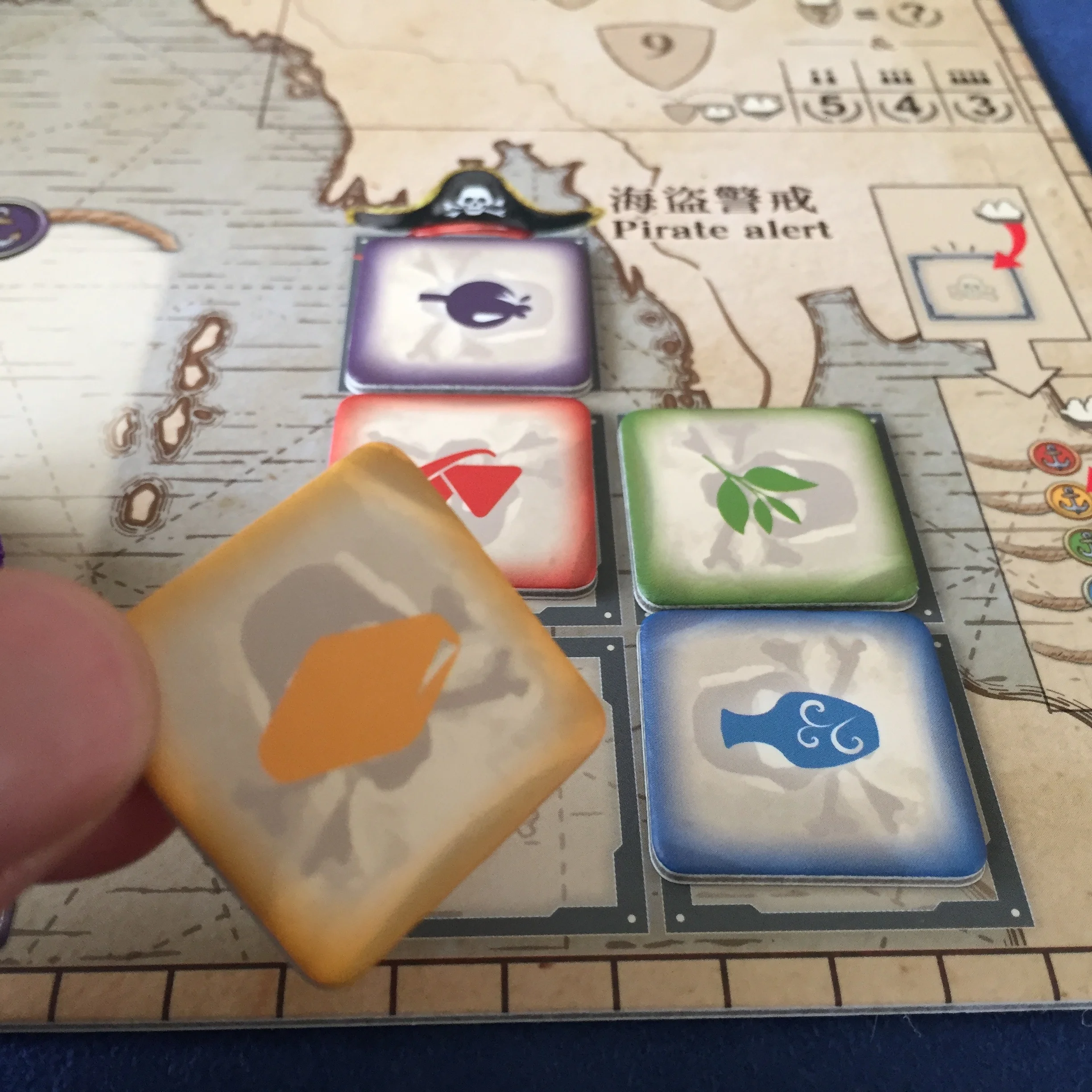 7A. Pass. Spend one action to pass, then take one of these raid markers. At the beginning of the next round, gain a cargo ship from the general supply of the matching good!