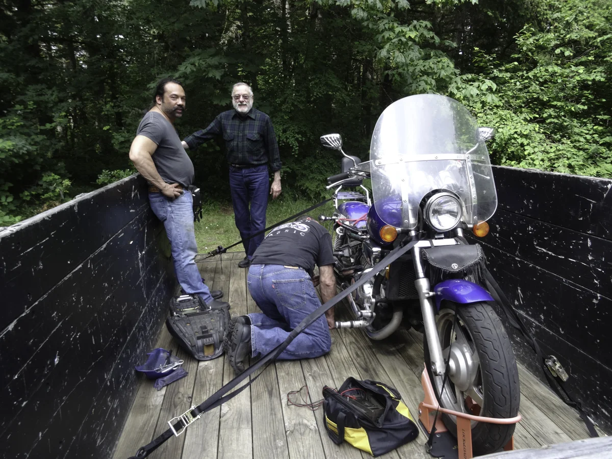 Mike's V65 gave up the ghost somewhere along the way. Dennis road all the way back to Washington to get his trailer. Attempts to repair at camp were not successful as an electrical component failed. BRMC guys stick together.