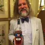 Colorful personality Jared Brown graciously offering a taste of his Havana Club rum! Photo by Adam Levy